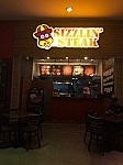 Sizzlin' Steak people