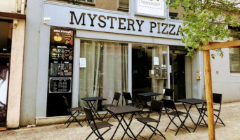 Mystery Pizza inside