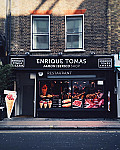 Enrique Tomas outside