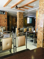 Rajmudra Family Restaurant Bar inside