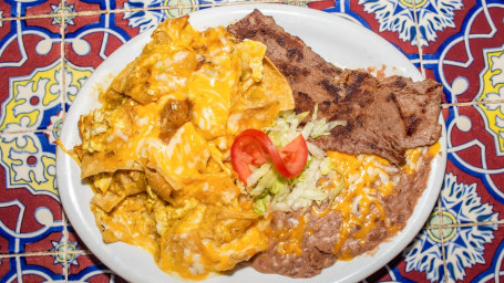 Carne Asada Con Chilaquiles Y Frijoles Breakfast