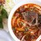 Bun Bo Hue Spicy Soup with Noodles, Pork Hock, Sliced Beef Shank, Pork Blood