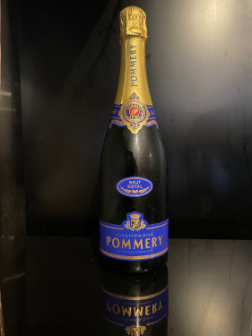 A Bottle Of Pommery Champagne And A Bucket Of Wings