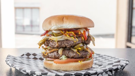 The Double Mega Extreme Cheeseburger