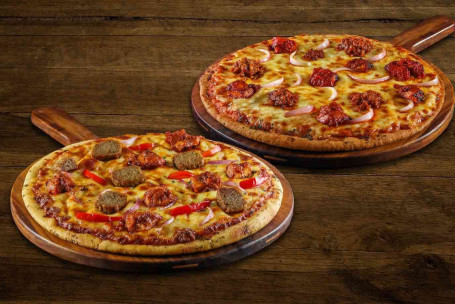 Deux Pizzas Moyennes Spéciales Non Végétariennes.