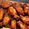 dé zhōu cuì shǔ jí shuǐ niú chéng là jī chì (7zhī German French Fries and Spicy Chicken Wings (7 Sticks
