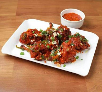 Chicken Lollipop With Schezwan Sauce (7 Pcs)