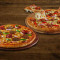 Pizza Paradisiaque Non Végétarienne-Moyenne Pizza Kheema Et Saucisse-Moyenne (Gratuite)