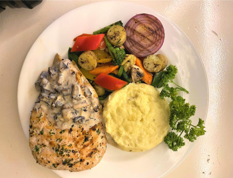 Grilled Chicken In Creamy Mushroom Sauce With Mashed Potato Saute Vegetables