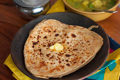 Tawa Paratha Per Plate