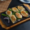 106. Sizzling Fried Pork Dumplings Hé Zhī Tiě Bǎn Jiān Jiǎo Zi