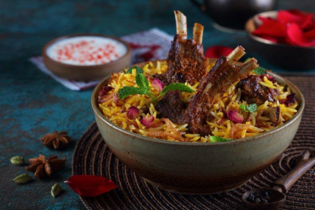 Dum Gosht Biryani Served With Raita Salad