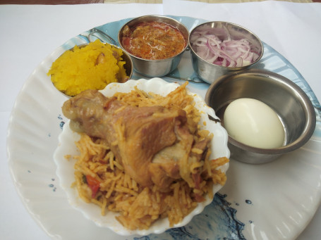 Chicken Biryani With Chicken 65 Onion Raita And Kesari
