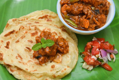 Parotta With Chicken Varuval And Plain Gravy