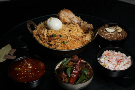 Chicken Biryani, Chicken Chukka, Raitha, Brinjal Sweet