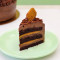 Eggless Chocolate Biscoff Layered Cake Slice