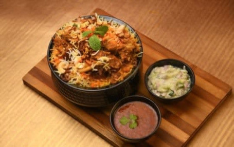 Chicken Biryani 500 Gm Onion Lemon Salad Mint Chutney Coke 250 Ml