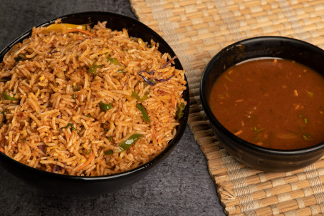 Schezwan Veg Fried Rice With Plain Manchurian Sauce