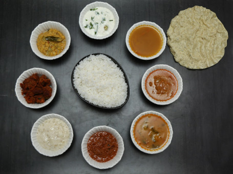 Meals (Fish Gravy (Or) Mutton Gravy Rice Papad Sambar Rasam Puli Kulampu Poriyal (Half)