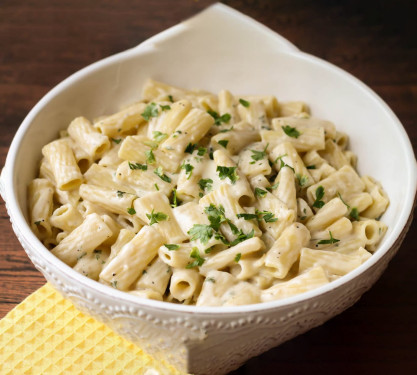 White Sauce Pasta Special Served With Ketchup