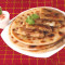 Dhaniya Paratha Served With Curd, Chutney And Pickle.