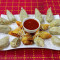 Steam Mushroom Momos 12 Pcs, Chicken Spring Roll, Served With Spicy Red Sauce And Green Chutney