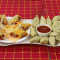 Steam Veggie Momos 12 Pcs Spring Roll 6 Pcs Served With Spicy Red Sauce And Green Chutney