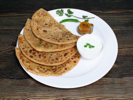 2 Sattu Paratha Served With Curd Pickle