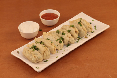 Steam Chicken Momos 8 Pcs Served With Red Spicy Chutney Mevnies