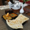 Kadhai Chicken With Biryani Rice And 2 Mughlai Tawa Paratha