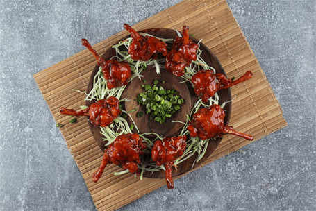 Crunchy Classic Chicken Lollipop In Schewan Sauce