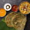Southak Parotta Served With Aloo Mango Curry
