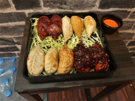 Chicken Platter Momo(2Pcssteam 2Pcsfried 2Pcspanfried 2Pcshotgarlic 2Pcsschezwan) (10 Pcs)