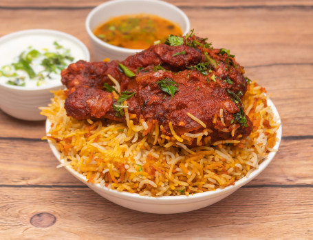 Chicken Fried Biryani Served With Raita And Salan)