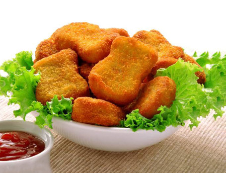 Chicken Nuggets (9Pc)[Served Along With A Delectable Dipping Sauce]