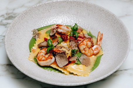 Handmade Ravioli Of Prawns And Seabass With Black Truffle