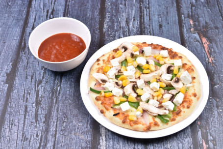 7 Regular Delux Veg Pizza (4 Slice)