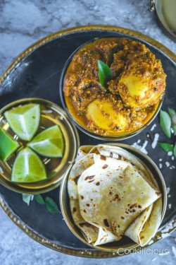 Egg Curry+4Roti+Chawal+Papad +Pickle +Salad