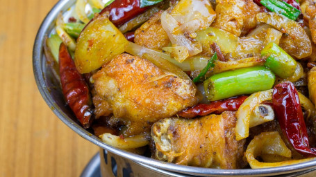 Stir-Fried Spicy Pot With Chicken Má Xiāng Jī Guō