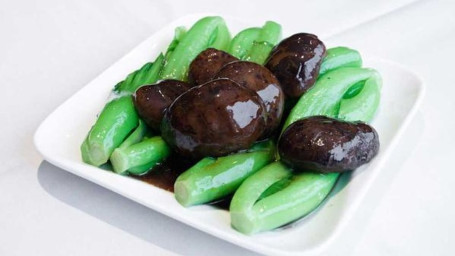 Shitake Mushrooms With Mustard Greens Huā Gū Bā Cài Dǎn