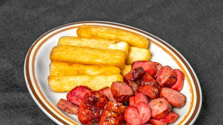 Sausage With Onions Fries Or Yuca