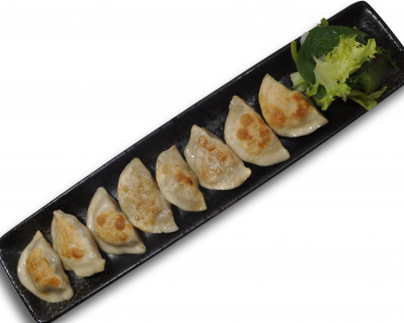 Pan Fried Pork And Vegetable Dumplings (Eight Pieces)