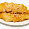 26. Deep-Fried Boneless Chicken Slices with Crushed Almond xìng rén zhà sū jī