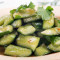 E12. Tossed Diced Cucumber With Garlic Sauce Pāi Huáng Guā