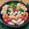 Assorted Sushi And Sashimi And Rolls Platter