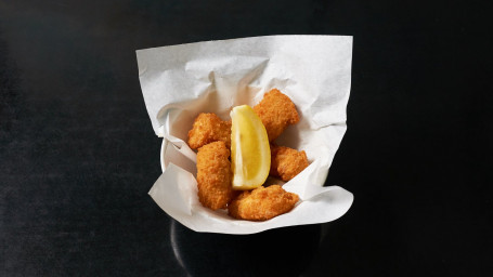 Breaded Wholetail Scampi (10) And Chips