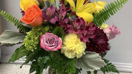 Seasonal Vase Of Mixed Flowers And Colors