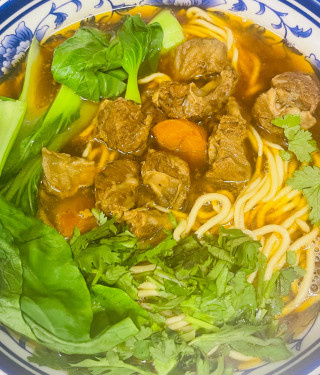 C12: Tomato Rice Noodle Soup With Braised Brisket