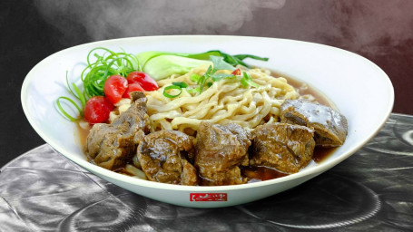 A4. Champion Braised Beef With Noodle In Tomato Soup Chuàng Yì Guān Jūn Fān Jiā Niú Ròu Miàn