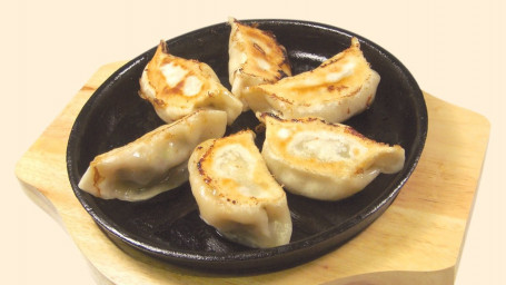 19. House-Made Pan Fried Dumplings Zì Jiā Zhì Jiǎo Zi